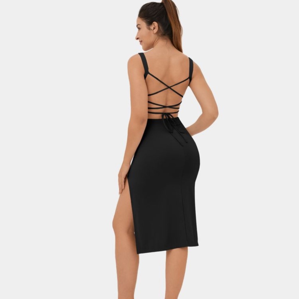Black Halara dress - XS. Tie back detail. NWT